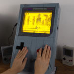 Modder builds giant Game Boy featuring a dreamy electroluminescent screen driven by custom graphics adapter — DIY retro console is fully functional with working buttons